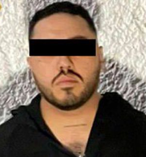 Detienen a sujeto con cargador 9mm